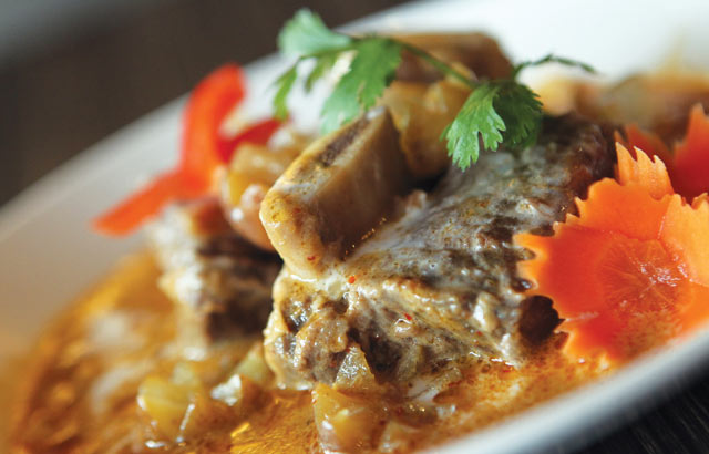 Khao San Thai Kitchen | Red chicken curry is a classic Thai dish where the heat is balanced with cool coconut milk.